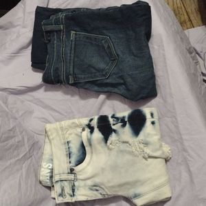 2 pairs never worn size 3/4 jeans